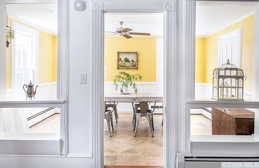 Breakfast room showing connection to kitchen and morning light