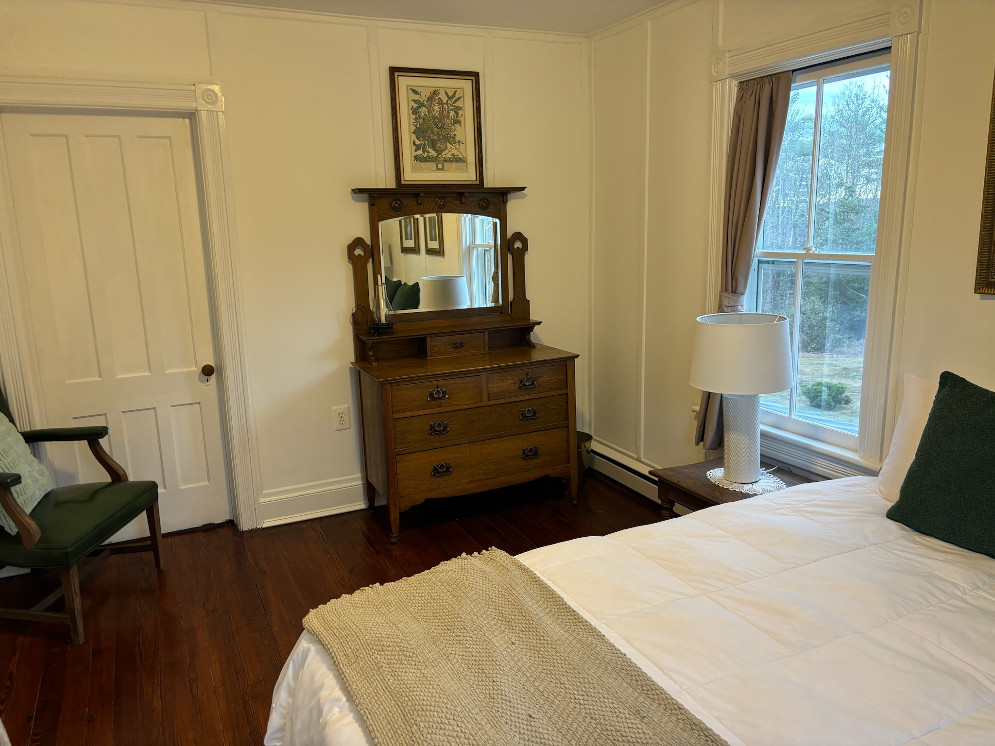 Bedroom three detail showing antique furnishings and original millwork
